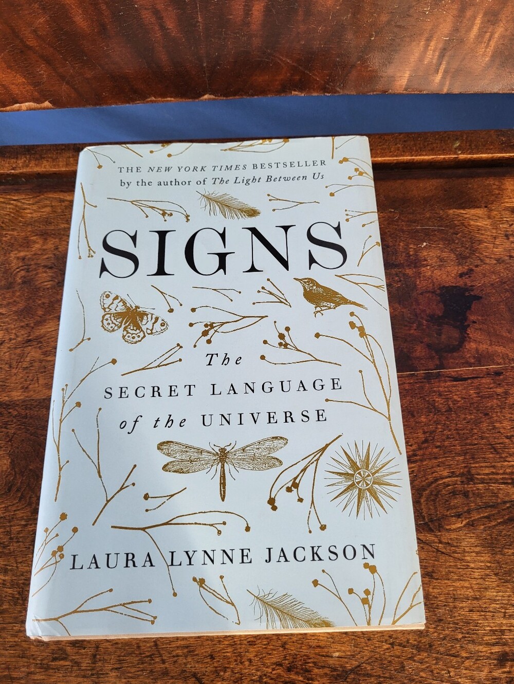 Signs Hardcover Book The Secret Language of the Universe Laura Lynne Jackson